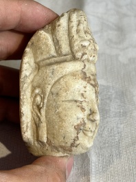 A Chinese marble head of Guanyin, Tang