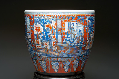 A large Chinese European-decorated blue and white fish bowl with narrative design, on a later wooden stand, Kangxi