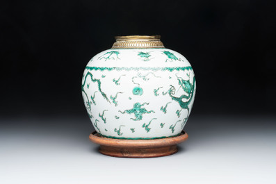 A Chinese green-enamelled 'dragon' jar mounted as a lamp, 18/19th C.