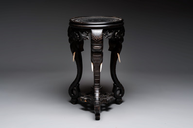 A large Chinese European-decorated blue and white fish bowl with narrative design, on a later wooden stand, Kangxi