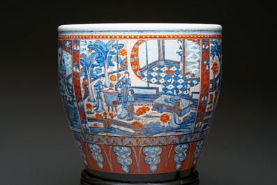 A large Chinese European-decorated blue and white fish bowl with narrative design, on a later wooden stand, Kangxi