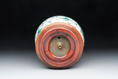 A Chinese green-enamelled 'dragon' jar mounted as a lamp, 18/19th C.