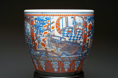 A large Chinese European-decorated blue and white fish bowl with narrative design, on a later wooden stand, Kangxi