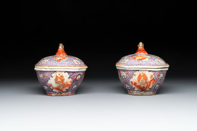 A pair of Chinese Canton famille rose 'mandarin subject' covered tureens and stands and a vase, Qianlong