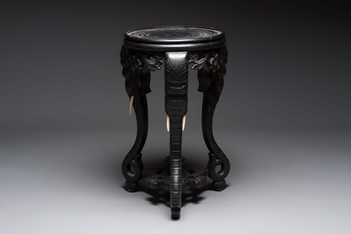 A large Chinese European-decorated blue and white fish bowl with narrative design, on a later wooden stand, Kangxi
