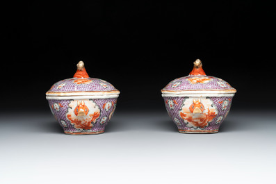 A pair of Chinese Canton famille rose 'mandarin subject' covered tureens and stands and a vase, Qianlong