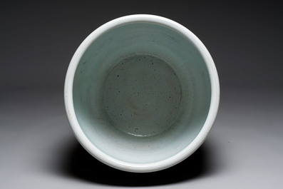 A large Chinese European-decorated blue and white fish bowl with narrative design, on a later wooden stand, Kangxi