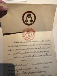 A bilingual Royal Thai Order of the 'White Elephant Award', signed by King Prajadhipok (Rama VII), dated 1929