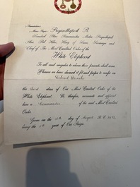 A bilingual Royal Thai Order of the 'White Elephant Award', signed by King Prajadhipok (Rama VII), dated 1929