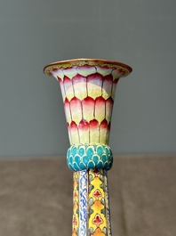 A pair of Chinese Canton enamel 'lotus' candlesticks, Yongzheng