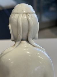 Two Chinese Dehua blanc de Chine figures of Guanyin and Shoulao and a pair of Buddhist lions, He Chaozong 何朝宗 mark, 18/19th C.