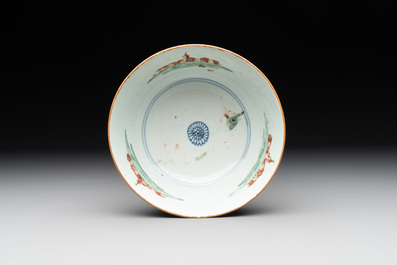 Two Dutch-decorated Chinese blue and white bowls with figures and landscapes, Qianlong