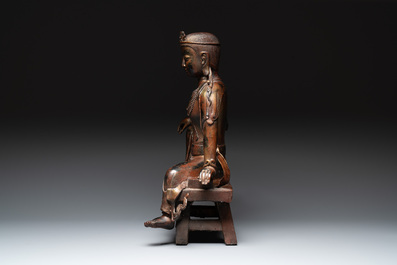 A large Chinese gilt bronze seated Bodhisattva, 20th C.