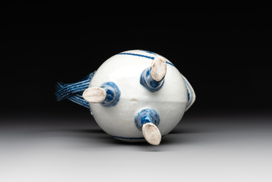 A pair of Chinese blue and white handled cups and saucers and a milk jug, Qianlong/Jiaqing