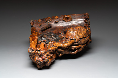 A Chinese carved wooden group and a natural root sculpture, 20th C.