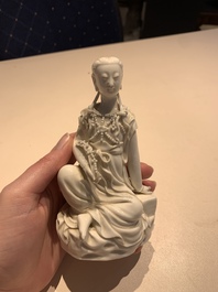 Two Chinese Dehua blanc de Chine figures of Guanyin, Xuande mark, 19/20th C.