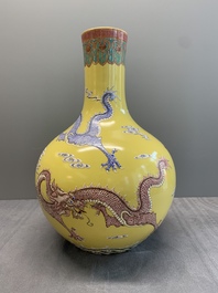 A Chinese famille rose yellow-ground 'dragon' 'tianqiuping' vase, 20th C.