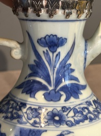 A Chinese silver-mounted blue and white 'Mongolian hunt' ewer, Transitional period