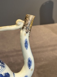 A Chinese silver-mounted blue and white 'Mongolian hunt' ewer, Transitional period