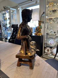 A large Chinese gilt bronze seated Bodhisattva, 20th C.