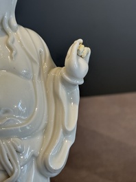 A pair of Chinese white-glazed figures and two Dehua blanc de Chine figures, Dehua 德化 and Xuande mark, 18th C. and later