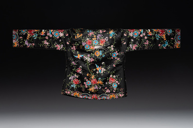 Two Chinese embroidered silk women's robes, 20th C.