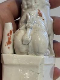 Two Chinese Dehua blanc de Chine figures of Guanyin and Shoulao and a pair of Buddhist lions, He Chaozong 何朝宗 mark, 18/19th C.