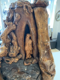 A Chinese carved wooden group and a natural root sculpture, 20th C.