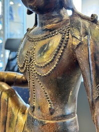 A large Chinese gilt bronze seated Bodhisattva, 20th C.