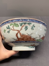 Two Dutch-decorated Chinese blue and white bowls with figures and landscapes, Qianlong
