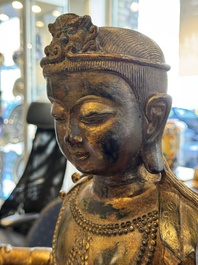A large Chinese gilt bronze seated Bodhisattva, 20th C.