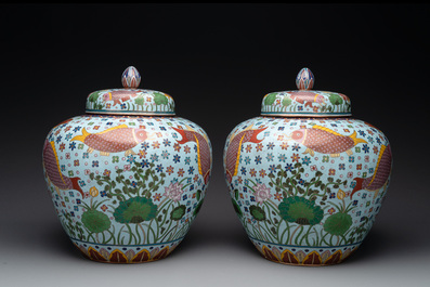 A pair of Chinese cloisonn&eacute; 'carps' vases and covers, Republic
