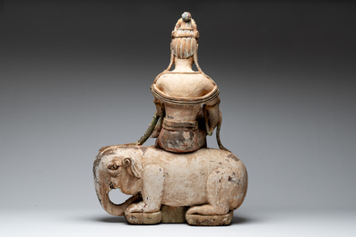 A large Chinese polychromed wooden Guanyin seated on an elephant, Republic