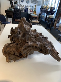 A Chinese carved wooden group and a natural root sculpture, 20th C.