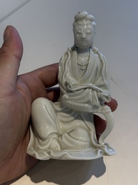 Two Chinese Dehua blanc de Chine figures of Guanyin and Shoulao and a pair of Buddhist lions, He Chaozong 何朝宗 mark, 18/19th C.
