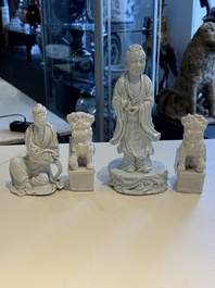 Two Chinese Dehua blanc de Chine figures of Guanyin and Shoulao and a pair of Buddhist lions, He Chaozong 何朝宗 mark, 18/19th C.