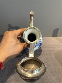 A Chinese silver-mounted blue and white 'Mongolian hunt' ewer, Transitional period