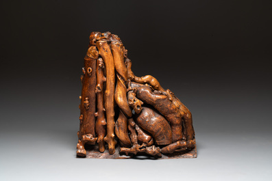 A Chinese carved wooden group and a natural root sculpture, 20th C.