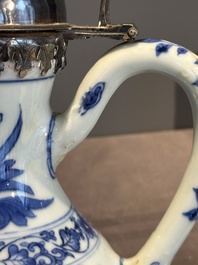 A Chinese silver-mounted blue and white 'Mongolian hunt' ewer, Transitional period