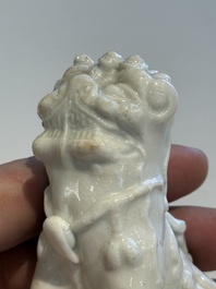 Two Chinese Dehua blanc de Chine figures of Guanyin and Shoulao and a pair of Buddhist lions, He Chaozong 何朝宗 mark, 18/19th C.