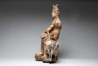 A large Chinese polychromed wooden Guanyin seated on an elephant, Republic