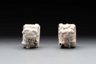 Two Chinese Dehua blanc de Chine figures of Guanyin and Shoulao and a pair of Buddhist lions, He Chaozong 何朝宗 mark, 18/19th C.