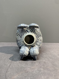A Chinese blue and white 'double mandarin duck' ewer or water dropper on wooden stand, Ming, ca. 1500