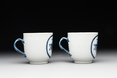 A pair of Chinese blue and white handled cups and saucers and a milk jug, Qianlong/Jiaqing