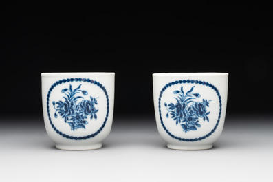 A pair of Chinese blue and white handled cups and saucers and a milk jug, Qianlong/Jiaqing