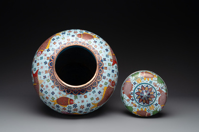 A pair of Chinese cloisonn&eacute; 'carps' vases and covers, Republic