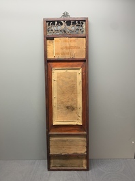 A Chinese carved wooden panel with famille rose plaques in the style of Wang Qi 王琦, dated 1932