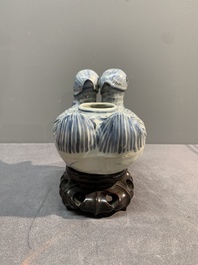 A Chinese blue and white 'double mandarin duck' ewer or water dropper on wooden stand, Ming, ca. 1500