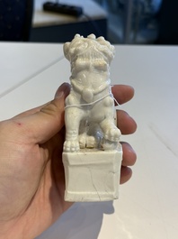 Two Chinese Dehua blanc de Chine figures of Guanyin and Shoulao and a pair of Buddhist lions, He Chaozong 何朝宗 mark, 18/19th C.