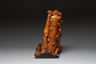 A Chinese carved wooden group and a natural root sculpture, 20th C.